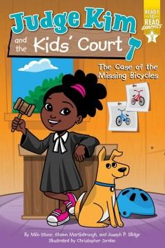 Illustration of Judge Kim, a young girl in a judge's robe holding a gavel, with a dog beside her. Bicycle pictures are on the wall. Cover of "Judge Kim and the Kids' Court: The Case of the Missing Bicycles.