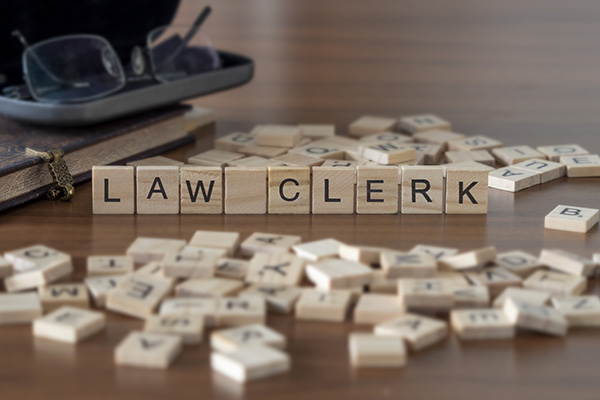 Scrabble tiles on a desk spell out 